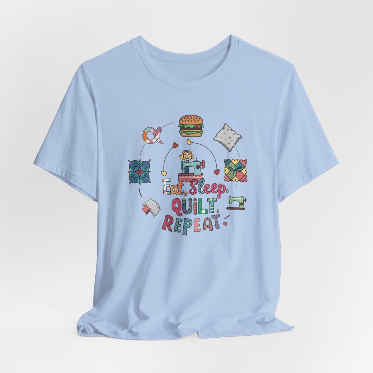 Assorted 'Eat Sleep Quilt Repeat' themed funny quilting t-shirts and gifts for quilters from the collection