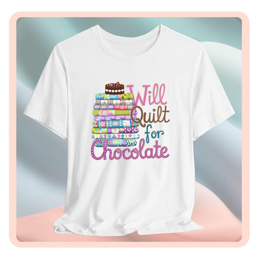 A t-shirt featuring a whimsical design of a colorful stack of quilts topped with a chocolate cake and the phrase 'Will Quilt for Chocolate,' perfect for quilters who love sweets.