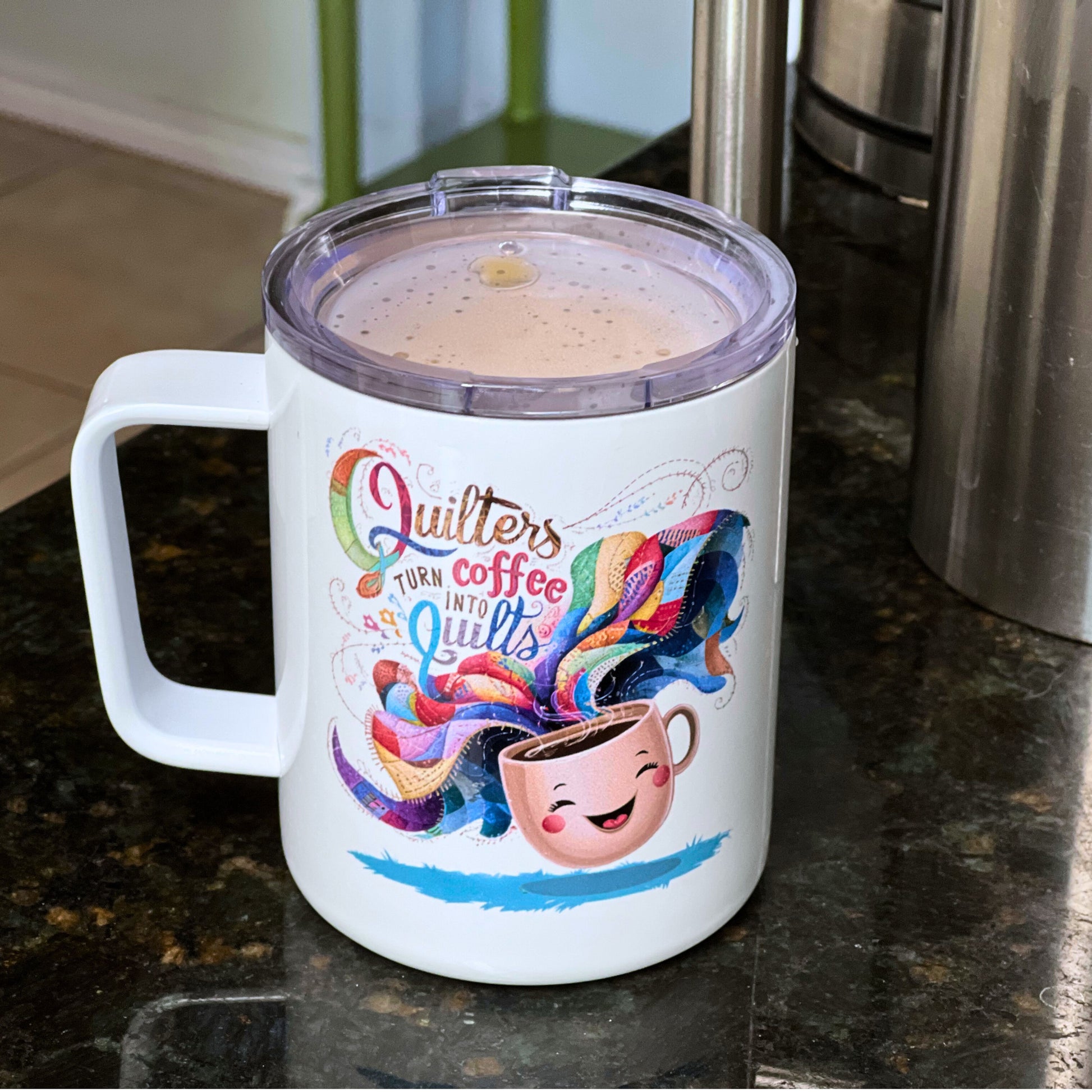 A funny quilting-inspired Insulated Mug with the phrase Quilters Turn Coffee Into Quilts showing a fun coffee cup and quilting design