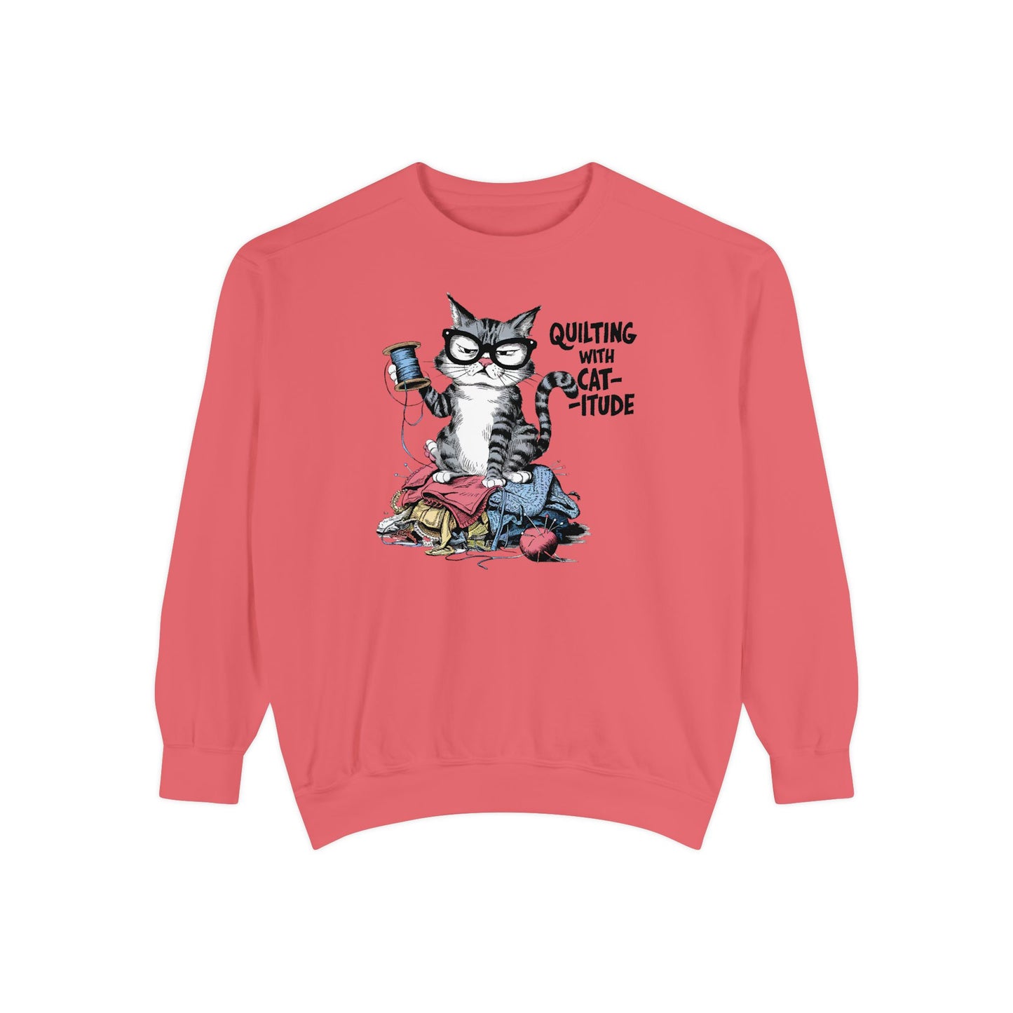 A Watermelon sweatshirt featuring a sassy cartoon cat sitting on a pile of colorful fabric, holding a spool of thread, with the phrase 'Quilting with Cat-itude,' perfect for quilters and cat lovers.