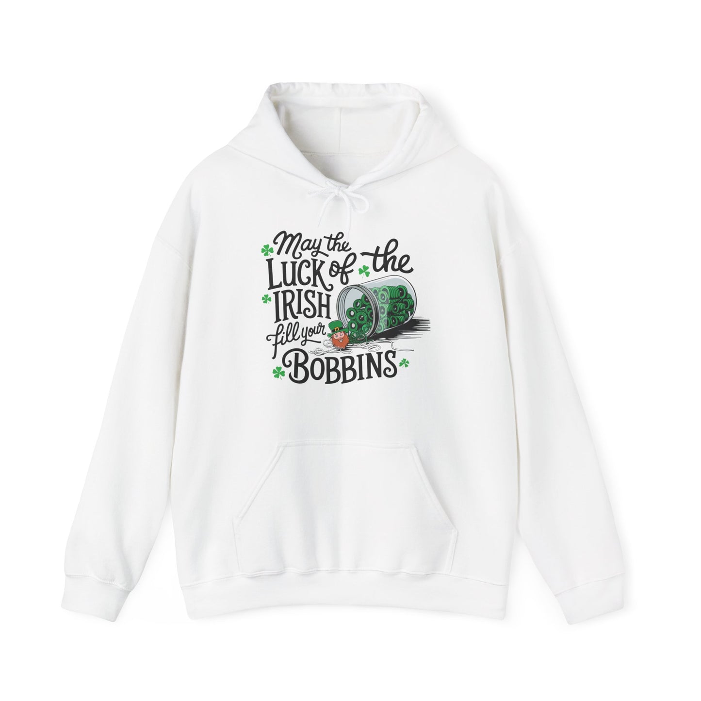 A White hoodie featuring a festive design with shamrocks, a spool of green thread, and the phrase 'May the Luck of the Irish Fill Your Bobbins,' perfect for quilters celebrating St. Patrick’s Day.