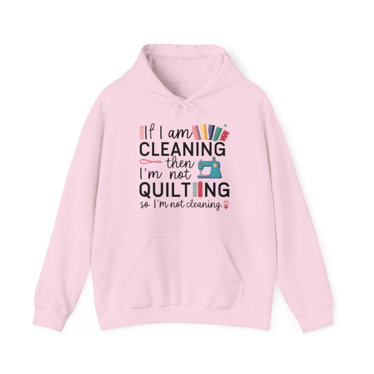 A Light Pink funny Hoodie with the phrase If I am Cleaning then I'm not Quilting in a bold and cheerful font with images of quilting icons and supplies