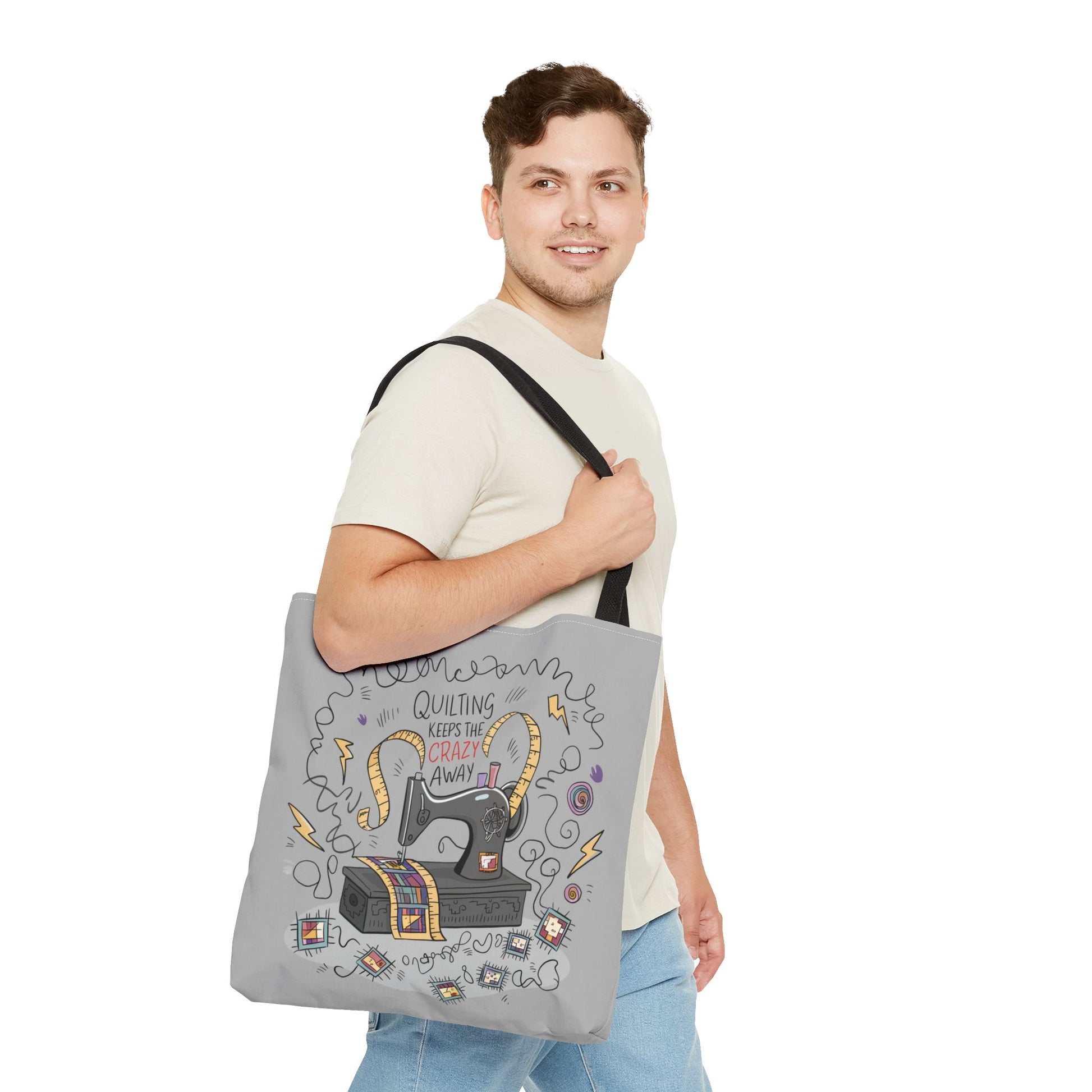 A quilting tote bag with a delightful quilting theme. Let your love of quilting keep the craziness at bay with this fun and quirky "Quilting Keeps the Crazy Away" 18" x 18" tote bag! Featuring a wild, crazy-looking sewing machine surrounded by scattered thread, this playful design perfectly captures the chaotic but calming nature of quilting. Whether you're juggling fabric, patterns, or just everyday life, this tote reminds you that quilting is the perfect way to keep things under control.