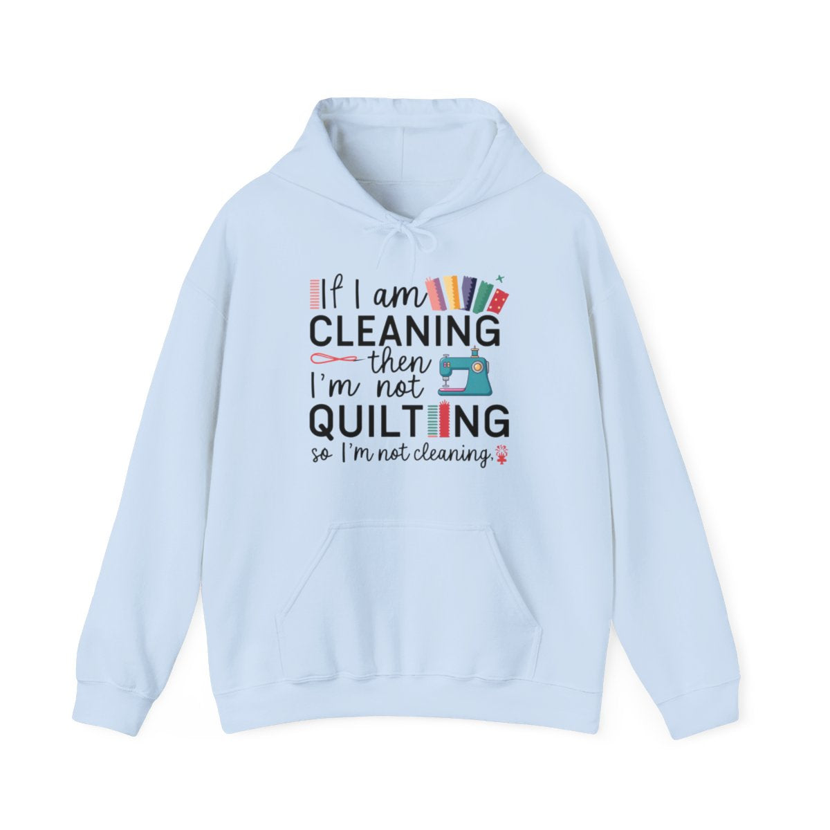 A Light Blue funny Hoodie with the phrase If I am Cleaning then I'm not Quilting in a bold and cheerful font with images of quilting icons and supplies