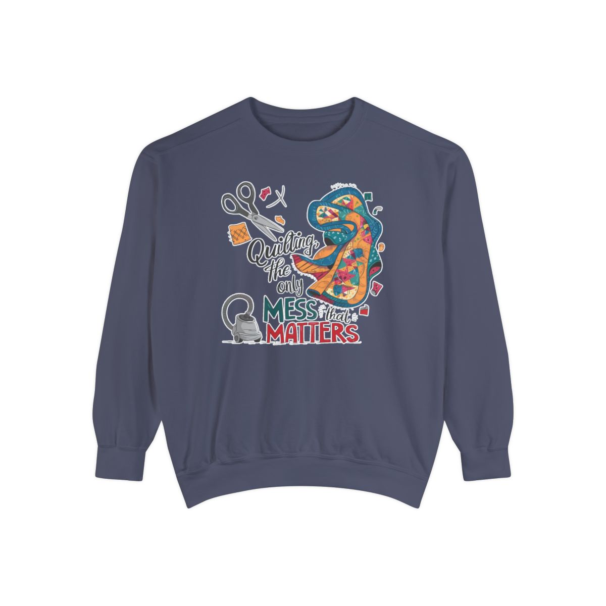 A Denim funny Sweatshirt with the phrase Quilting, the Only Mess that Matters and illustrations of fabric scraps, scissors, and a vacuum cleaner. Colorful quilt patterns swirl around the text, creating a playful and relatable design for quilting enthusiasts.