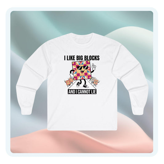 A long-sleeve t-shirt featuring a colorful quilt block character wearing sunglasses with the phrase 'I Like Big Blocks and I Cannot Lie,' perfect for quilters with a playful style.