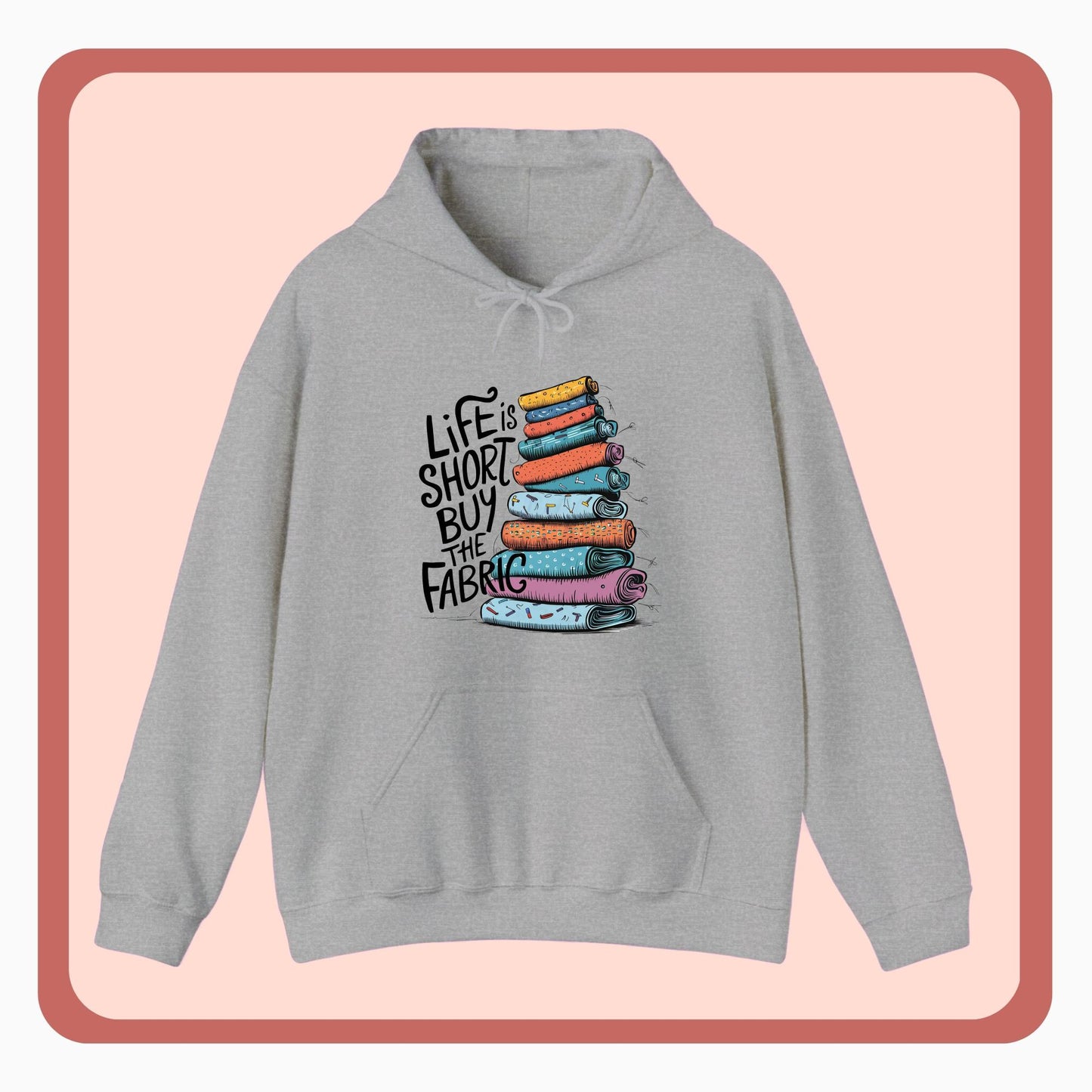 A funny Hoodie with the phrase Life is Short, Buy the Fabric with the label 'Life is Short, Buy the Fabric' next to a graphic of pile of fabric