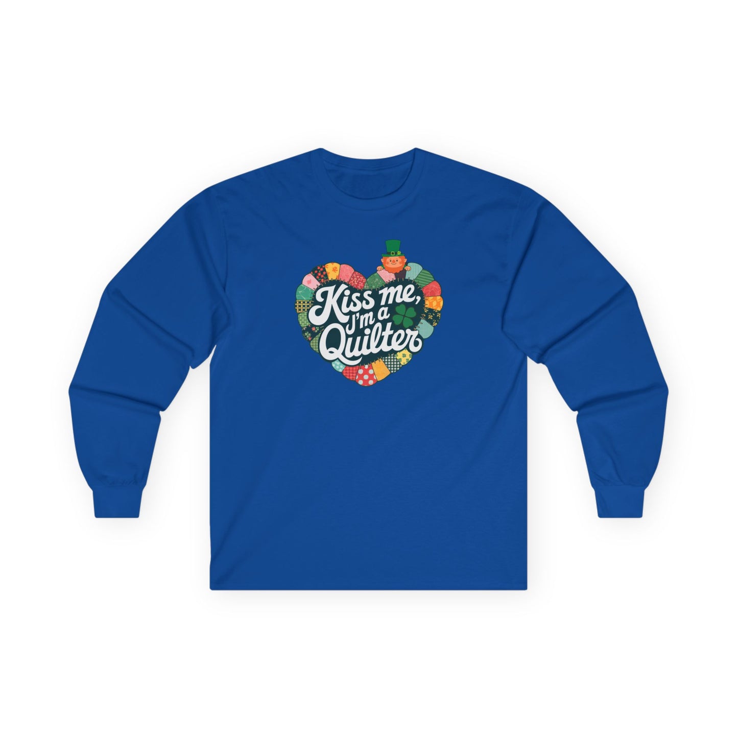 A Royal long-sleeve t-shirt featuring a heart-shaped patchwork quilt design with shamrocks, a leprechaun, and the phrase 'Kiss Me, I’m a Quilter,' perfect for St. Patrick’s Day quilting fun.