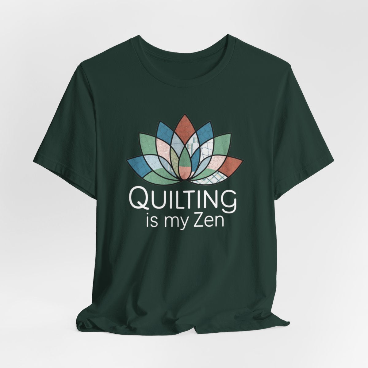 A Forest funny quilting T-Shirt with the phrase Quilting is my Zen on a quilting-themed t-shirt with a lotus flower design made of various quilt patterns and textures. 