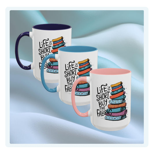 A funny Ceramic Mug with the phrase Life is Short, Buy the Fabric with the label 'Life is Short, Buy the Fabric' next to a graphic of A funny pile of fabric