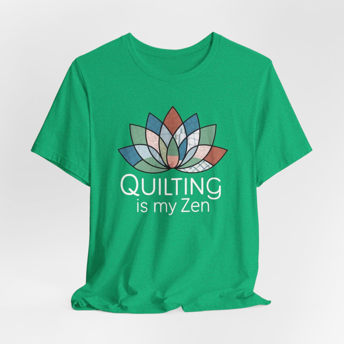 A Heather Kelly funny quilting T-Shirt with the phrase Quilting is my Zen on a quilting-themed t-shirt with a lotus flower design made of various quilt patterns and textures. 