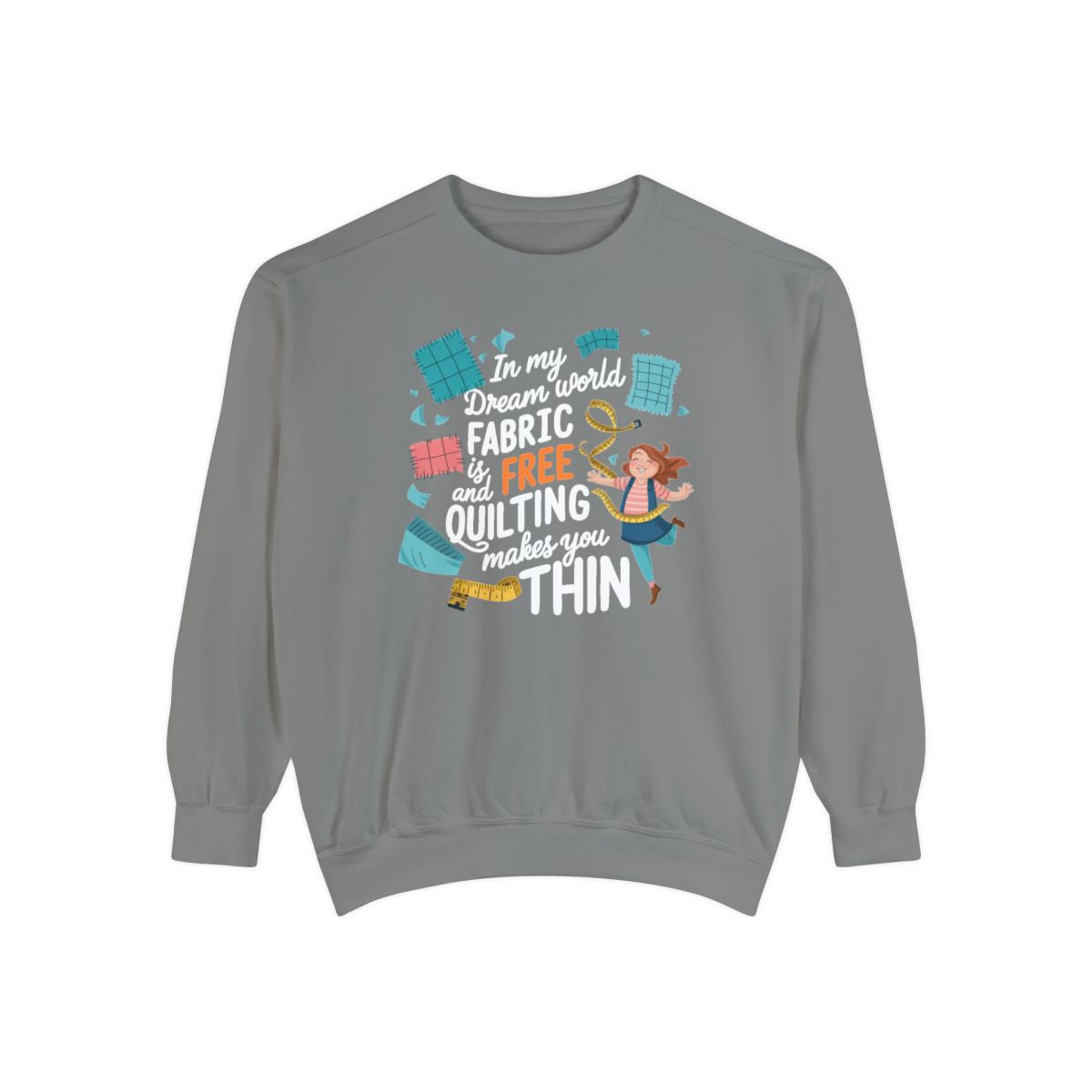 A Grey funny Sweatshirt with the phrase Fabric is Free and Quilting Makes You Thin in font with a cheerful quilter jumping for joy