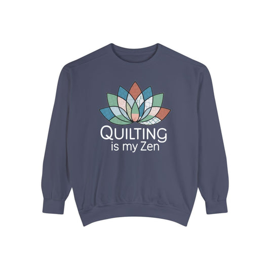 A Denim funny Sweatshirt with the phrase Quilting is my Zen on a quilting-themed t-shirt with a lotus flower design made of various quilt patterns and textures. 