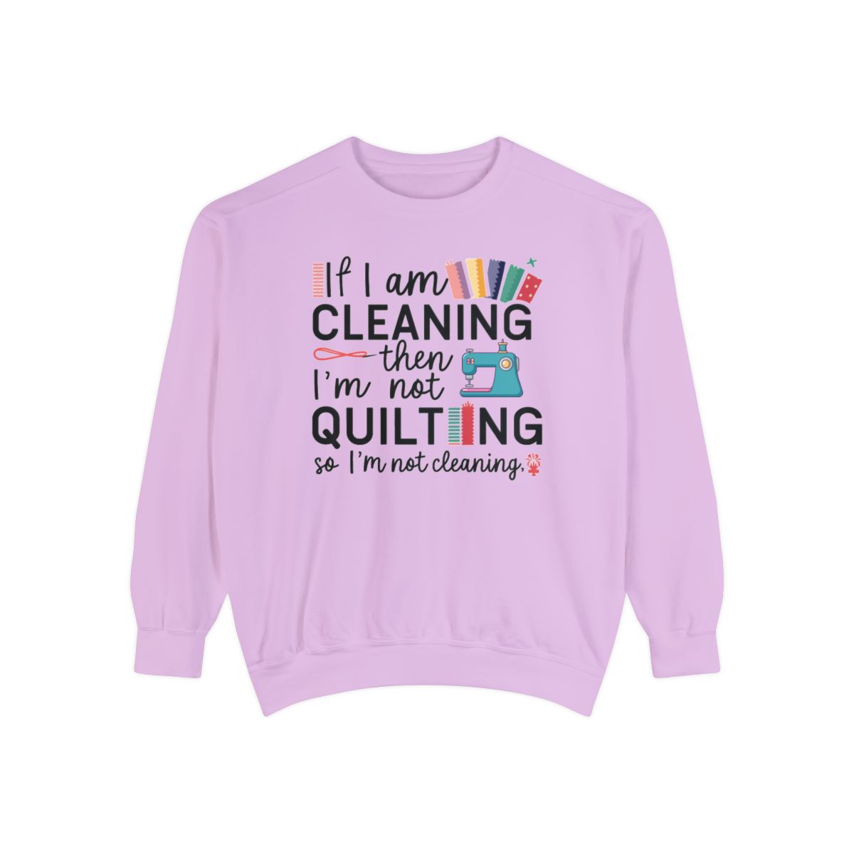 An Orchid funny Sweatshirt with the phrase If I am Cleaning then I'm not Quilting in a bold and cheerful font with images of quilting icons and supplies