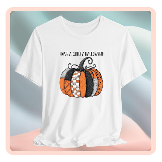 A Halloween Quilting T-Shirt featuring patchwork pumpkin with various quilt patterns. Mix of Halloween and traditional quilt motifs. Intricate stitching details. Text reads "Have a Quilty Halloween". Ideal for quilters who love Halloween.