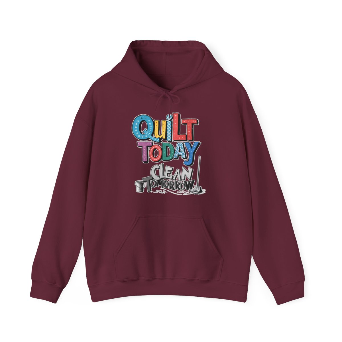 A Maroon funny Hoodie with the phrase Quilt Today, Clean Tomorrow in a bold and cheerful font with a broom off to the side