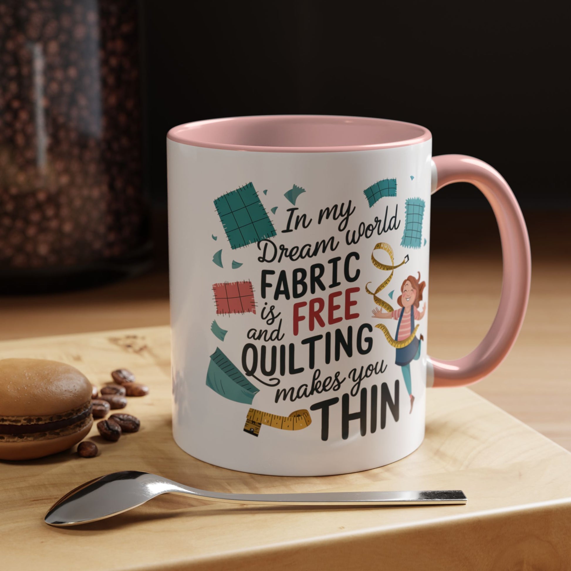 A funny Ceramic Mug with the phrase Fabric is Free and Quilting Makes You Thin in A funny font with a cheerful quilter jumping for joy