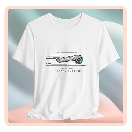 A T-shirt featuring minimalist graphic of a sleek rotary cutter in motion with speed lines. Text below reads "RUNS WITH ROTARY CUTTERS" in a modern font.