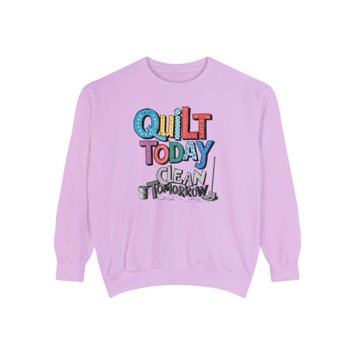 An Orchid funny Sweatshirt with the phrase Quilt Today, Clean Tomorrow in a bold and cheerful font with a broom off to the side