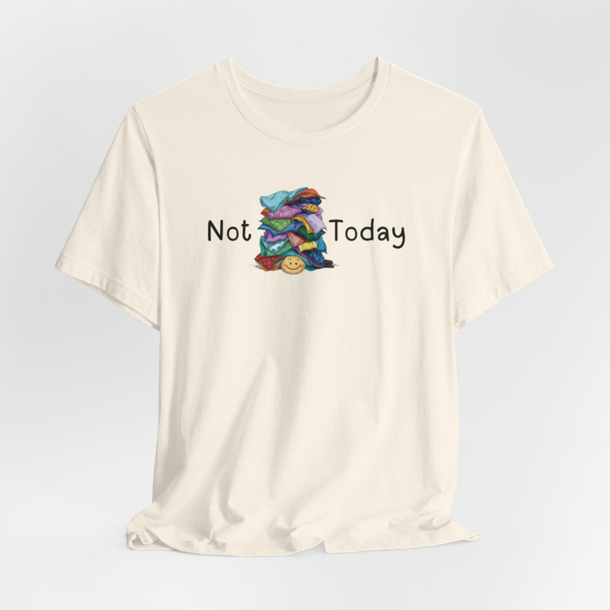 A Natural funny quilting T-Shirt with the phrase Not Today showing an enormous pile of fabric on top of a cheerful quilter