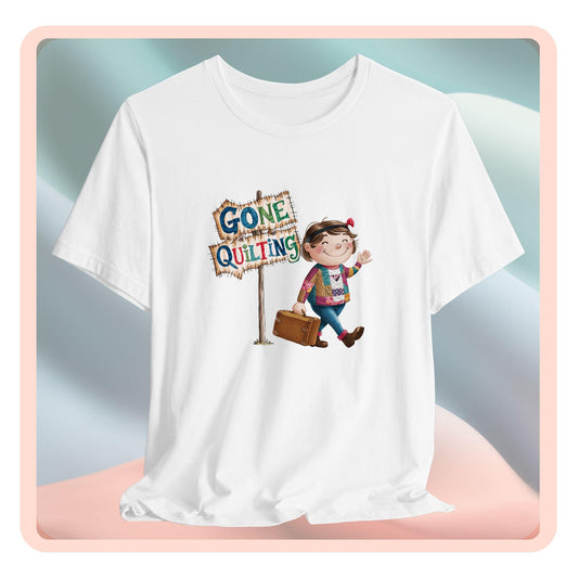 Afun quilting T-Shirt with a cartoon illustration of a smiling girl wearing a patchwork jacket, carrying a suitcase next to a wooden sign that reads "Gone Quilting" in colorful letters.