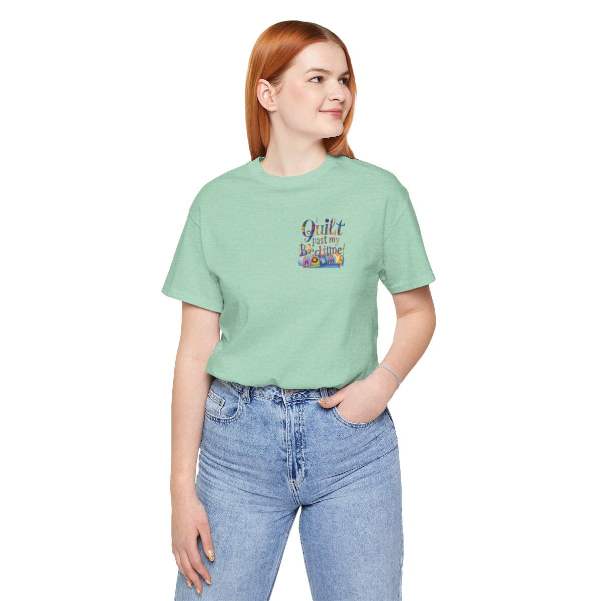 A Heather Mint funny quilting t-shirt with playful typography reading "I Quilt Past My Bedtime". Features quilting-themed elements like patchwork patterns and a sewing machine, perfect for enthusiastic quilters who enjoy late-night crafting sessions.