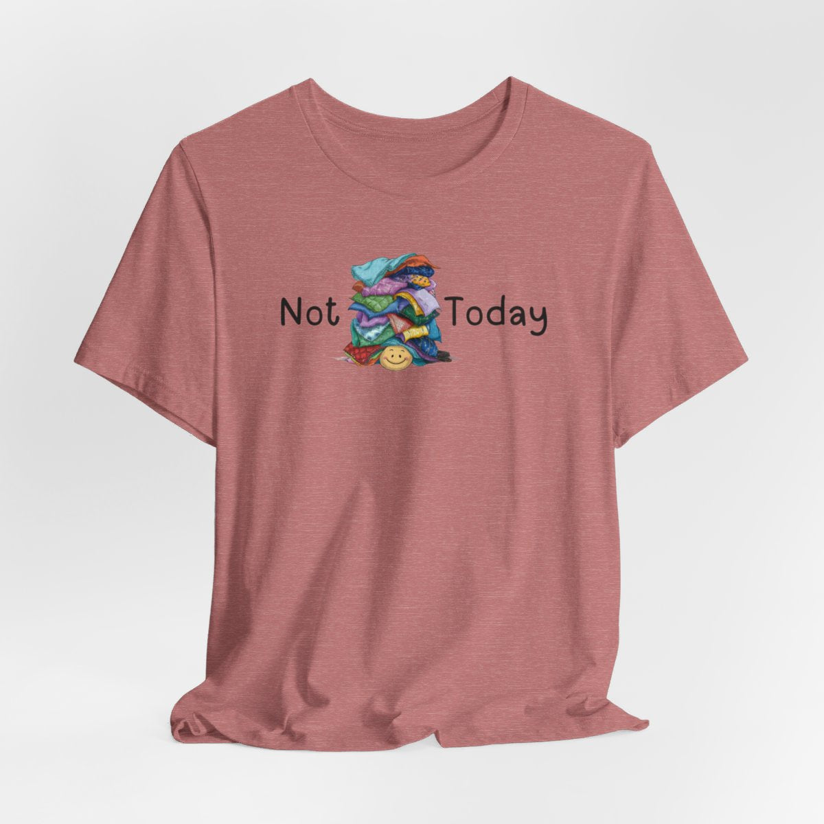 A Heather Mauve funny quilting T-Shirt with the phrase Not Today showing an enormous pile of fabric on top of a cheerful quilter