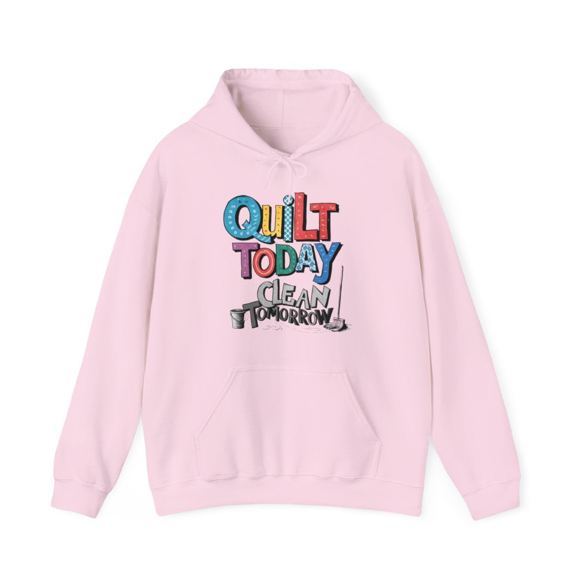 A Light Pink funny Hoodie with the phrase Quilt Today, Clean Tomorrow in a bold and cheerful font with a broom off to the side