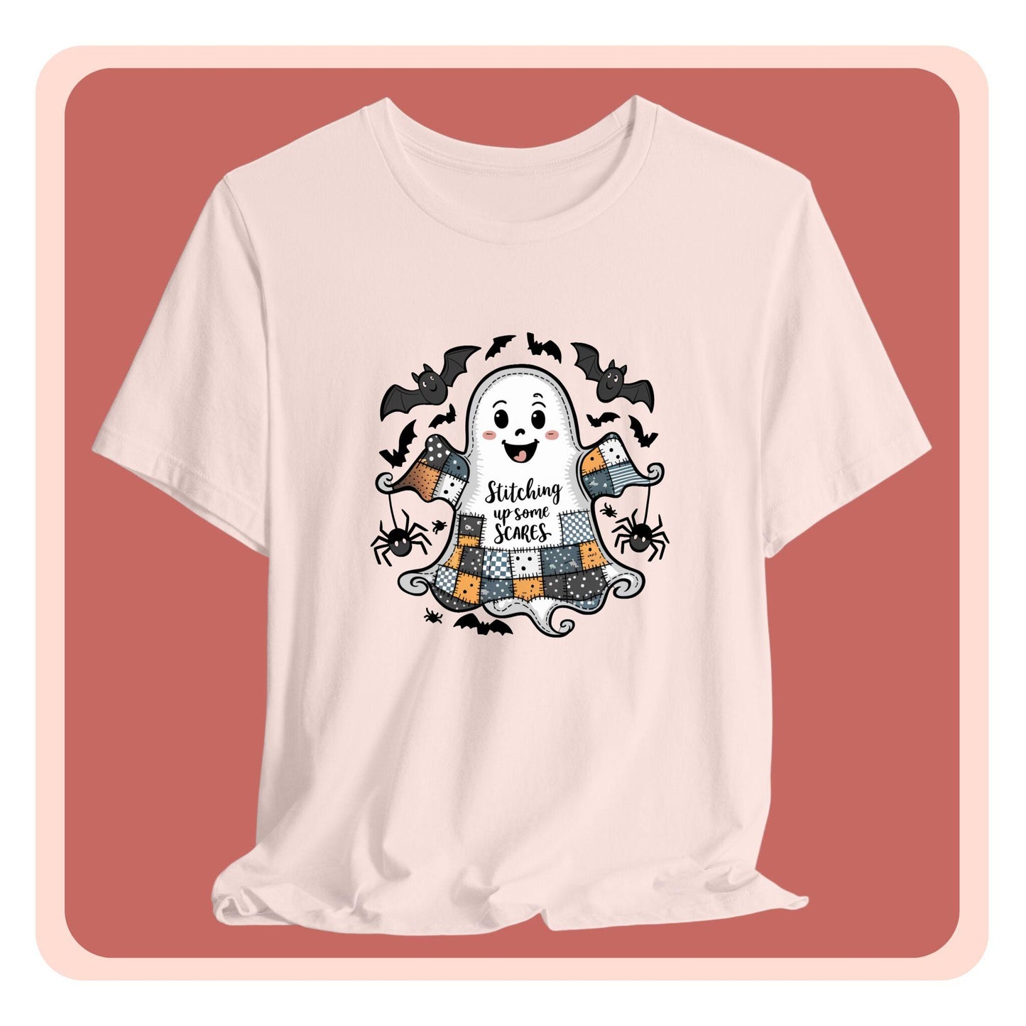 A Halloween Quilting T-Shirt featuring a smiling ghost with quilted patchwork body. Halloween-themed quilt patterns. Cute bats and spiders around ghost. Text reads "Stitching up some Scares". Ideal for quilters who enjoy Halloween themes.