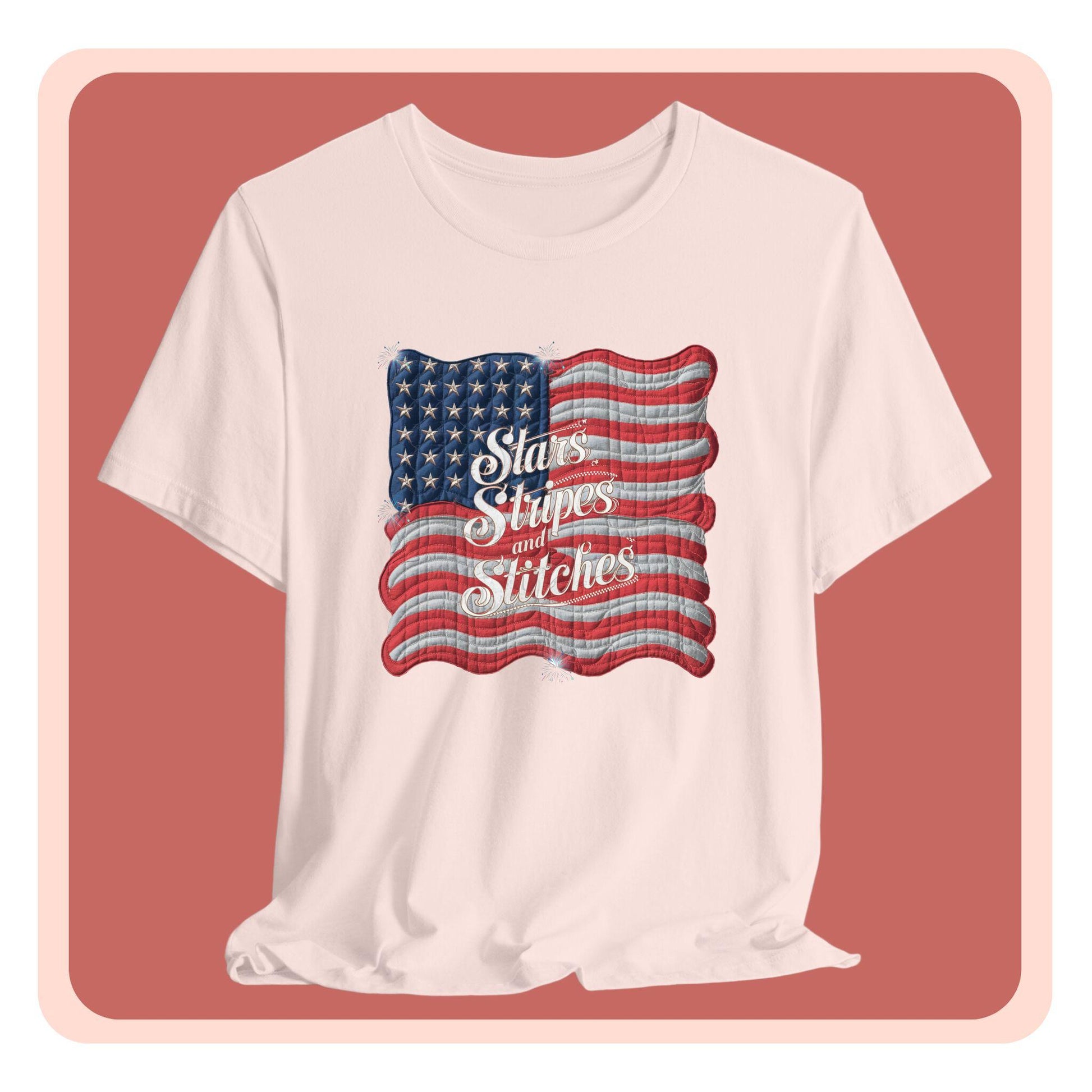 A T-shirt featuring quilted American flag design with text "Stars Stripes and Stitches" overlaid in stylized, patriotic font. Fireworks accent the corners.