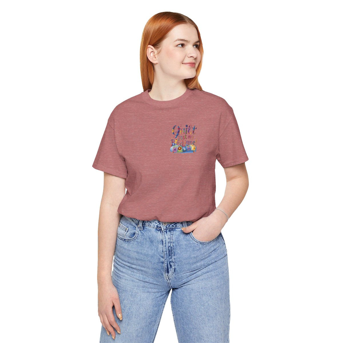 A Heather Mauve funny quilting t-shirt with playful typography reading "I Quilt Past My Bedtime". Features quilting-themed elements like patchwork patterns and a sewing machine, perfect for enthusiastic quilters who enjoy late-night crafting sessions.