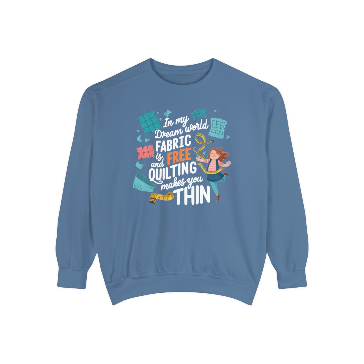 A Blue Jean funny Sweatshirt with the phrase Fabric is Free and Quilting Makes You Thin in font with a cheerful quilter jumping for joy