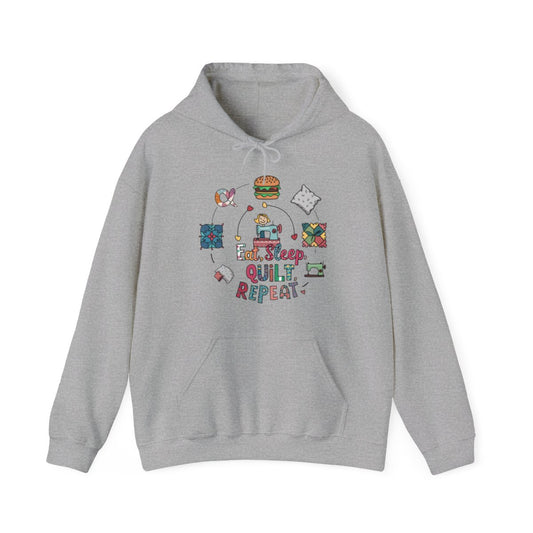 A Sport Grey funny Hoodie with the phrase Eat, Sleep, Quilt, Repeat  showing the cycle of a quilter's day with eating, sleeping, and quilting