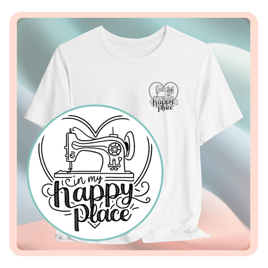 A funny quilting T-shirt design showing a sewing machine inside a heart shape with decorative swirls. Text reads "In my happy place" in mixed fonts, emphasizing quilting as a source of joy and contentment for enthusiasts.